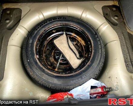 Бежевий Кіа Ріо, об'ємом двигуна 1.4 л та пробігом 201 тис. км за 4500 $, фото 4 на Automoto.ua