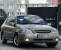 Бежевий Кіа Ріо, об'ємом двигуна 1.34 л та пробігом 134 тис. км за 3999 $, фото 23 на Automoto.ua