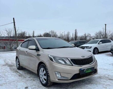 Бежевий Кіа Ріо, об'ємом двигуна 1.6 л та пробігом 162 тис. км за 5999 $, фото 1 на Automoto.ua