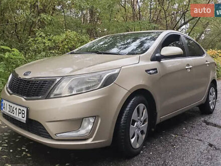 Бежевий Кіа Ріо, об'ємом двигуна 1.4 л та пробігом 187 тис. км за 6450 $, фото 1 на Automoto.ua