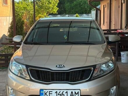 Бежевый Киа Рио, объемом двигателя 1.59 л и пробегом 225 тыс. км за 8800 $, фото 1 на Automoto.ua