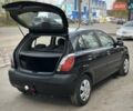 Черный Киа Рио, объемом двигателя 1.4 л и пробегом 233 тыс. км за 5900 $, фото 29 на Automoto.ua