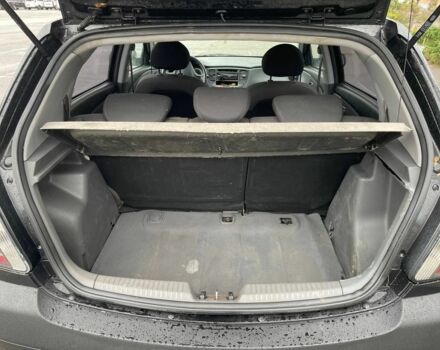 Чорний Кіа Ріо, об'ємом двигуна 1.3 л та пробігом 265 тис. км за 3600 $, фото 7 на Automoto.ua