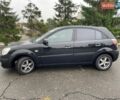 Черный Киа Рио, объемом двигателя 1.4 л и пробегом 270 тыс. км за 3550 $, фото 1 на Automoto.ua