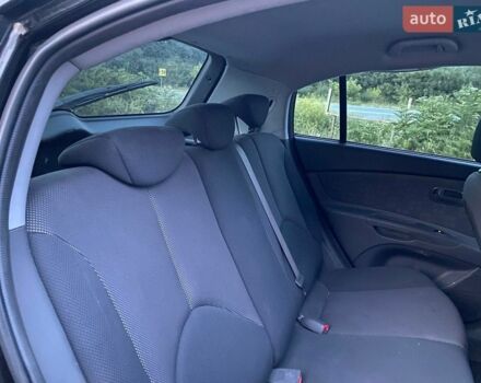 Чорний Кіа Ріо, об'ємом двигуна 1.6 л та пробігом 198 тис. км за 3699 $, фото 2 на Automoto.ua
