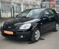 Черный Киа Рио, объемом двигателя 1.4 л и пробегом 233 тыс. км за 5900 $, фото 23 на Automoto.ua