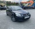 Черный Киа Рио, объемом двигателя 1.4 л и пробегом 265 тыс. км за 4300 $, фото 1 на Automoto.ua