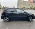 Черный Киа Рио, объемом двигателя 1.4 л и пробегом 270 тыс. км за 3550 $, фото 4 на Automoto.ua