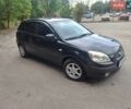 Чорний Кіа Ріо, об'ємом двигуна 1.6 л та пробігом 228 тис. км за 5500 $, фото 2 на Automoto.ua