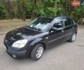 Чорний Кіа Ріо, об'ємом двигуна 1.6 л та пробігом 228 тис. км за 5500 $, фото 1 на Automoto.ua