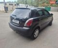 Чорний Кіа Ріо, об'ємом двигуна 1.6 л та пробігом 228 тис. км за 5500 $, фото 4 на Automoto.ua