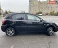 Чорний Кіа Ріо, об'ємом двигуна 1.4 л та пробігом 270 тис. км за 4200 $, фото 8 на Automoto.ua