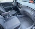 Черный Киа Рио, объемом двигателя 1.4 л и пробегом 265 тыс. км за 4300 $, фото 14 на Automoto.ua