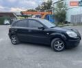 Черный Киа Рио, объемом двигателя 1.4 л и пробегом 265 тыс. км за 4300 $, фото 3 на Automoto.ua
