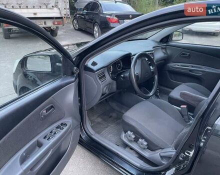 Чорний Кіа Ріо, об'ємом двигуна 1.4 л та пробігом 270 тис. км за 4200 $, фото 2 на Automoto.ua