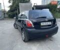 Черный Киа Рио, объемом двигателя 1.4 л и пробегом 265 тыс. км за 4300 $, фото 7 на Automoto.ua