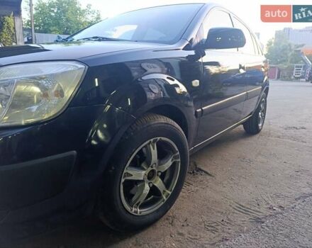 Чорний Кіа Ріо, об'ємом двигуна 1.34 л та пробігом 265 тис. км за 3950 $, фото 4 на Automoto.ua