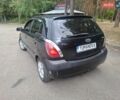 Чорний Кіа Ріо, об'ємом двигуна 1.6 л та пробігом 228 тис. км за 5500 $, фото 3 на Automoto.ua