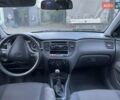 Чорний Кіа Ріо, об'ємом двигуна 1.4 л та пробігом 270 тис. км за 4200 $, фото 3 на Automoto.ua