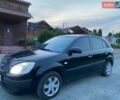 Чорний Кіа Ріо, об'ємом двигуна 1.6 л та пробігом 198 тис. км за 3699 $, фото 6 на Automoto.ua
