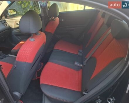 Чорний Кіа Ріо, об'ємом двигуна 1.6 л та пробігом 228 тис. км за 5500 $, фото 9 на Automoto.ua