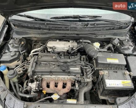 Черный Киа Рио, объемом двигателя 1.4 л и пробегом 270 тыс. км за 3550 $, фото 1 на Automoto.ua