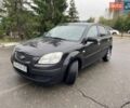 Черный Киа Рио, объемом двигателя 1.4 л и пробегом 270 тыс. км за 3550 $, фото 3 на Automoto.ua