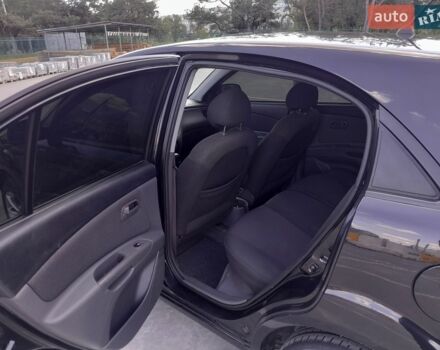 Черный Киа Рио, объемом двигателя 1.4 л и пробегом 185 тыс. км за 4100 $, фото 7 на Automoto.ua