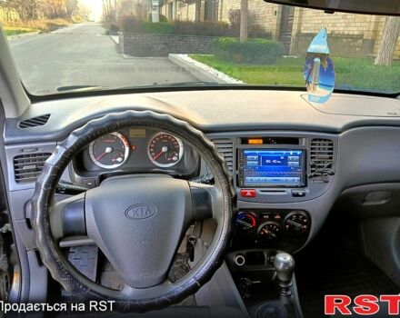 Чорний Кіа Ріо, об'ємом двигуна 1.4 л та пробігом 297 тис. км за 4500 $, фото 4 на Automoto.ua