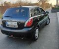 Черный Киа Рио, объемом двигателя 1.4 л и пробегом 297 тыс. км за 4500 $, фото 3 на Automoto.ua