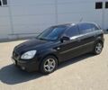 Черный Киа Рио, объемом двигателя 1.34 л и пробегом 201 тыс. км за 5400 $, фото 8 на Automoto.ua