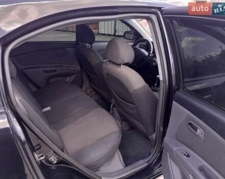 Черный Киа Рио, объемом двигателя 1.4 л и пробегом 185 тыс. км за 4100 $, фото 6 на Automoto.ua