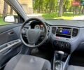 Чорний Кіа Ріо, об'ємом двигуна 1.4 л та пробігом 56 тис. км за 6700 $, фото 18 на Automoto.ua