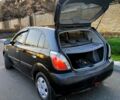 Чорний Кіа Ріо, об'ємом двигуна 1.4 л та пробігом 297 тис. км за 4500 $, фото 8 на Automoto.ua
