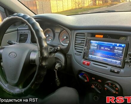 Чорний Кіа Ріо, об'ємом двигуна 1.4 л та пробігом 297 тис. км за 4500 $, фото 5 на Automoto.ua