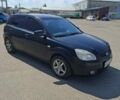 Черный Киа Рио, объемом двигателя 1.34 л и пробегом 201 тыс. км за 5400 $, фото 1 на Automoto.ua