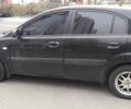 Чорний Кіа Ріо, об'ємом двигуна 1.4 л та пробігом 132 тис. км за 4000 $, фото 1 на Automoto.ua