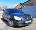 Чорний Кіа Ріо, об'ємом двигуна 1.4 л та пробігом 297 тис. км за 4000 $, фото 2 на Automoto.ua