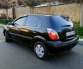 Чорний Кіа Ріо, об'ємом двигуна 1.4 л та пробігом 297 тис. км за 4500 $, фото 1 на Automoto.ua