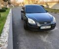 Черный Киа Рио, объемом двигателя 1.4 л и пробегом 297 тыс. км за 4500 $, фото 1 на Automoto.ua