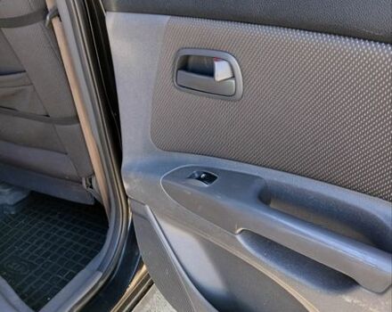 Черный Киа Рио, объемом двигателя 1.4 л и пробегом 297 тыс. км за 4300 $, фото 8 на Automoto.ua