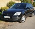 Черный Киа Рио, объемом двигателя 1.3 л и пробегом 180 тыс. км за 3999 $, фото 1 на Automoto.ua