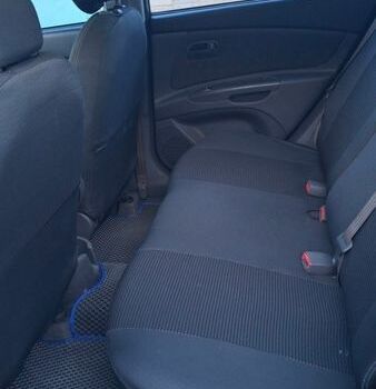 Черный Киа Рио, объемом двигателя 1.4 л и пробегом 201 тыс. км за 4200 $, фото 12 на Automoto.ua