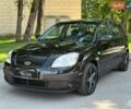 Чорний Кіа Ріо, об'ємом двигуна 1.4 л та пробігом 56 тис. км за 6700 $, фото 1 на Automoto.ua
