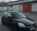 Черный Киа Рио, объемом двигателя 1.4 л и пробегом 201 тыс. км за 4200 $, фото 1 на Automoto.ua