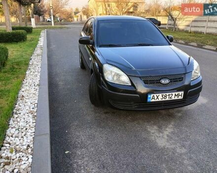 Черный Киа Рио, объемом двигателя 1.4 л и пробегом 297 тыс. км за 4500 $, фото 1 на Automoto.ua