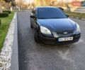 Черный Киа Рио, объемом двигателя 1.4 л и пробегом 297 тыс. км за 4500 $, фото 1 на Automoto.ua