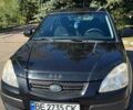 Черный Киа Рио, объемом двигателя 1.4 л и пробегом 350 тыс. км за 4200 $, фото 1 на Automoto.ua