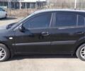 Черный Киа Рио, объемом двигателя 1.4 л и пробегом 132 тыс. км за 4000 $, фото 1 на Automoto.ua