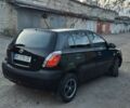 Черный Киа Рио, объемом двигателя 1.4 л и пробегом 201 тыс. км за 4200 $, фото 5 на Automoto.ua